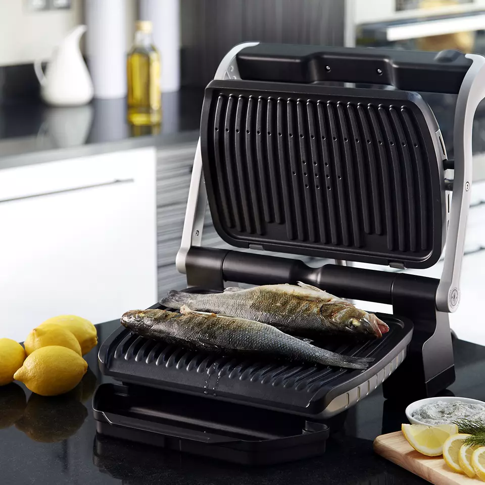 Design Produit - Innovation - Design Industriel -Modélisation CAO 3D - Demaneo, agence de design industriel Lyon - Grâce à la technologie intelligente brevetée, OptiGrill ajuste automatiquement les paramètres de cuisson en fonction de l'épaisseur de la viande pour des cuissons parfaites de vos viandes et poissons.